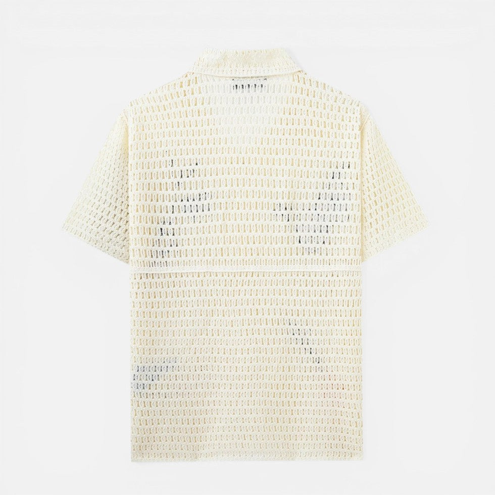 Back view of a cream short-sleeve crochet shirt with a collar