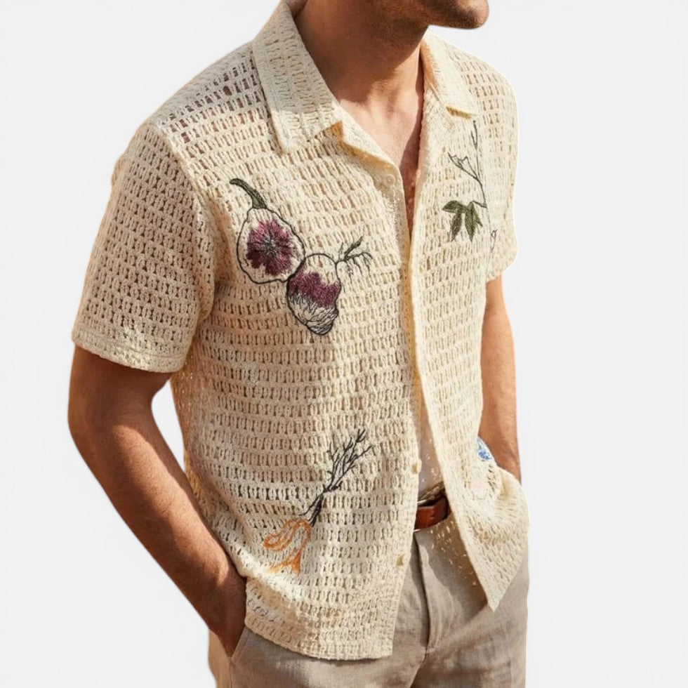 Man wearing a cream open-weave crochet shirt unbuttoned