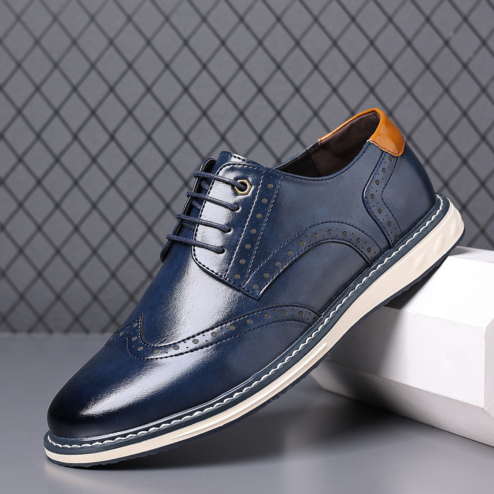 Blue lace-up brogue dress shoe with wingtip perforations