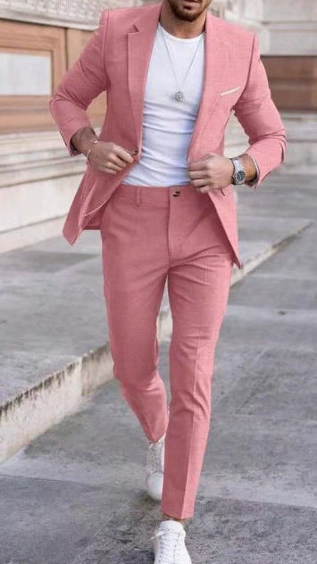 Man wearing a pink suit with a white T-shirt