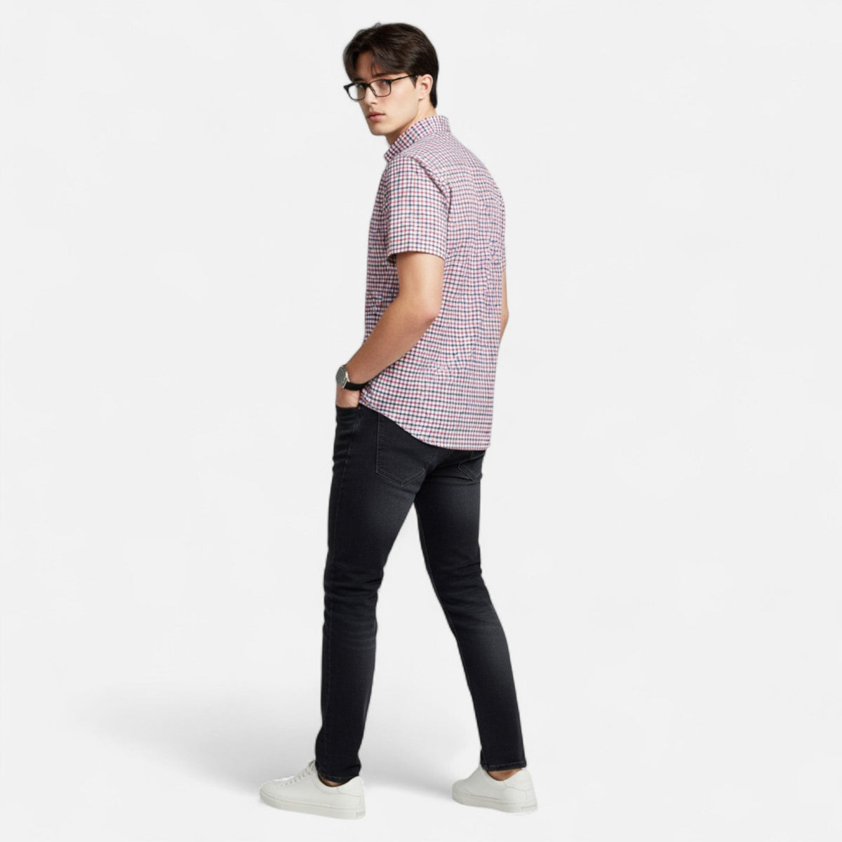 Side and back view of a red and navy small-check short-sleeve button-down shirt on a man
