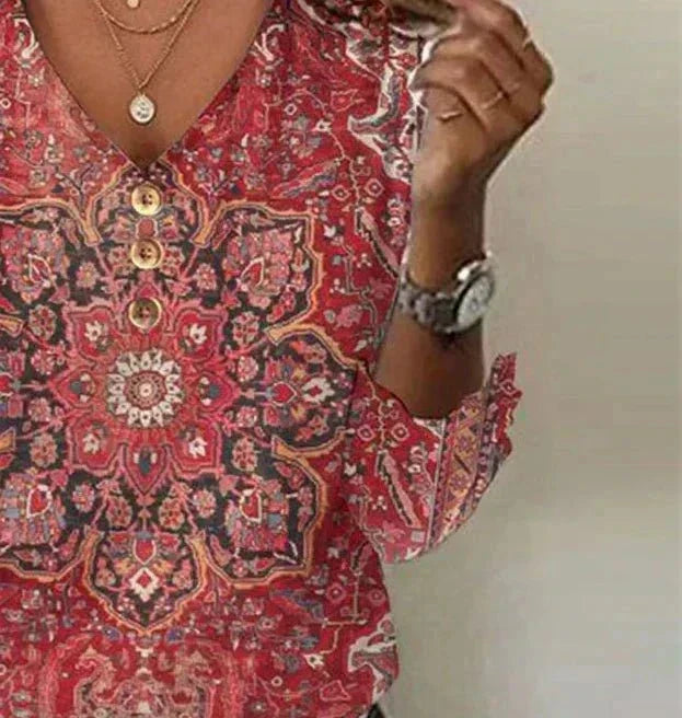 Audrey bohemian print summer blouse with flowing fit, featuring vibrant patterns and lightweight fabric.