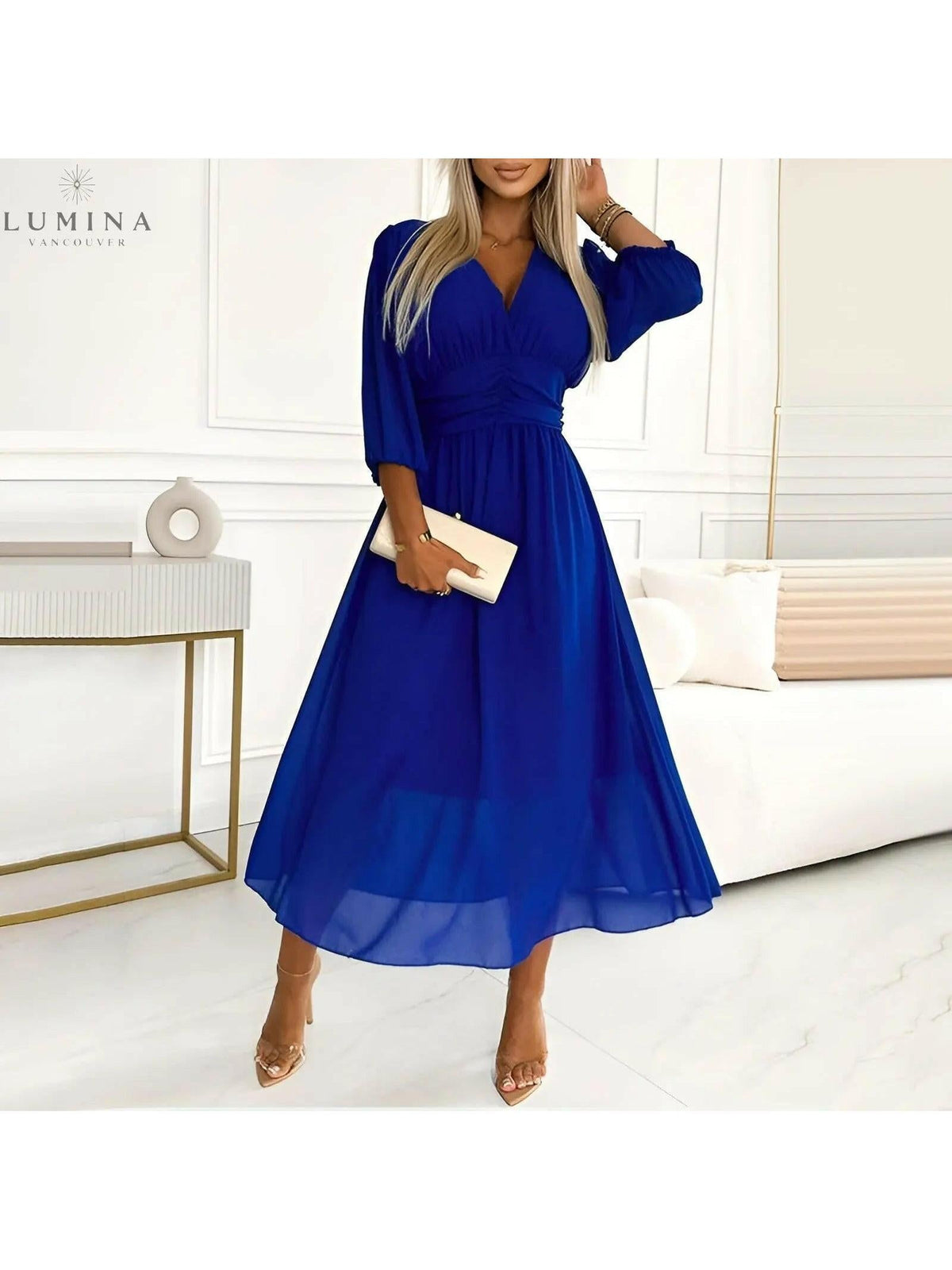 Blue Ana stylish wrap evening dress, featuring a flattering silhouette, ideal for wedding guest attire.