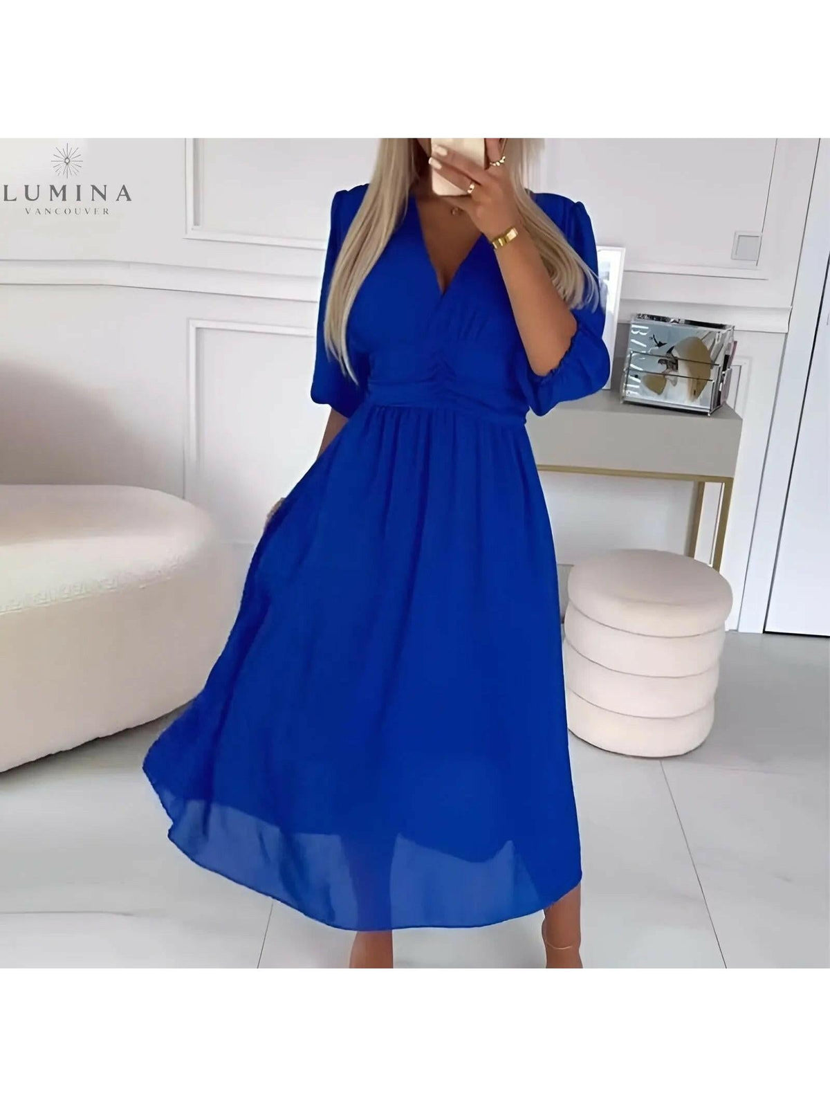 Blue Ana stylish wrap evening dress, featuring a flattering silhouette perfect for wedding guest attire.