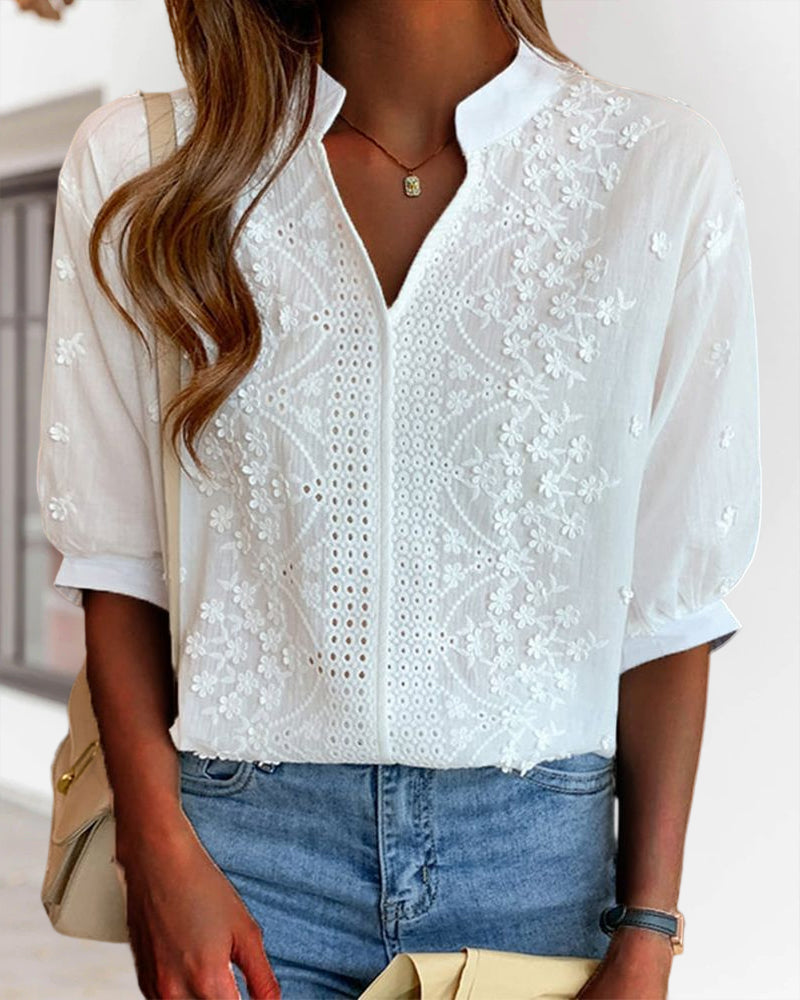 Victoria elegant puff sleeve blouse with V-neck design, showcasing stylish fabric and feminine fit.