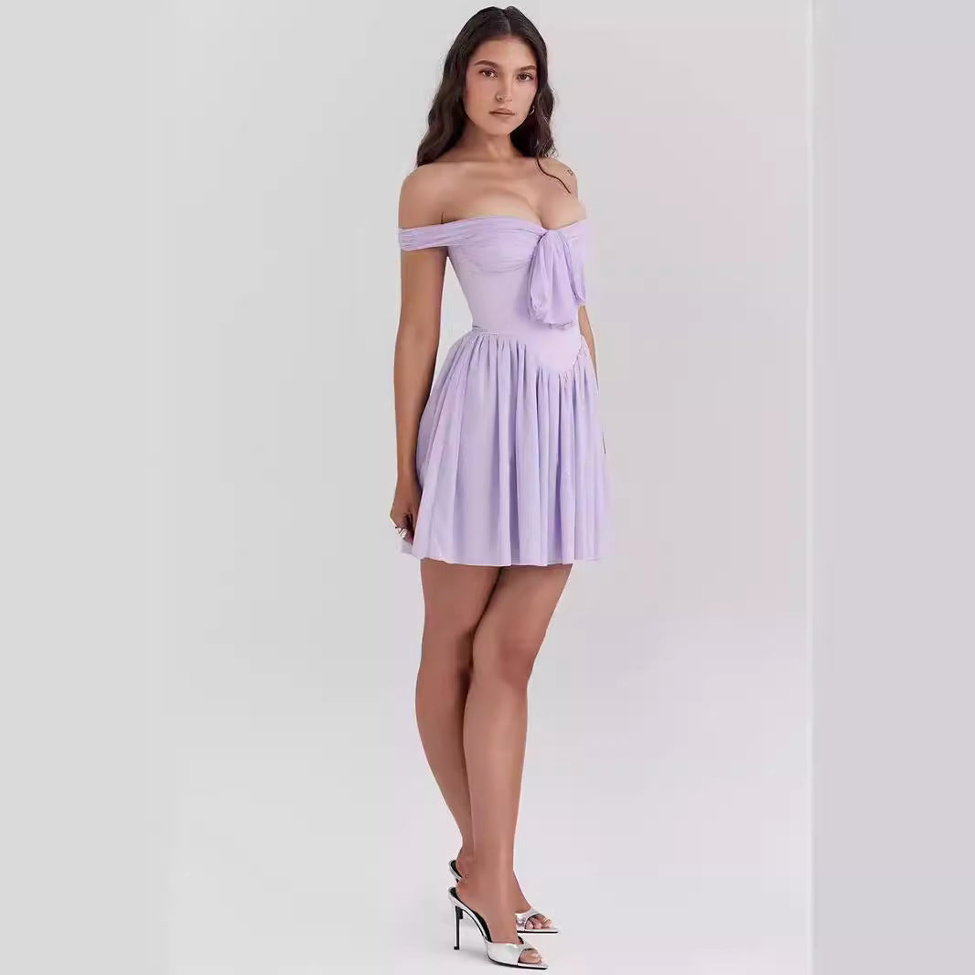Lavender purple off-shoulder mini dress with bow front, featuring a fitted silhouette and stylish design.