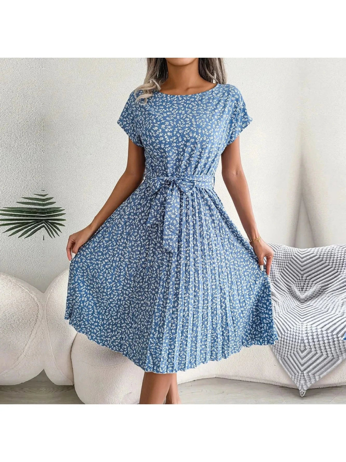 Blue Anabelle floral pleated midi dress, featuring a flowing, elegant design perfect for summer occasions.