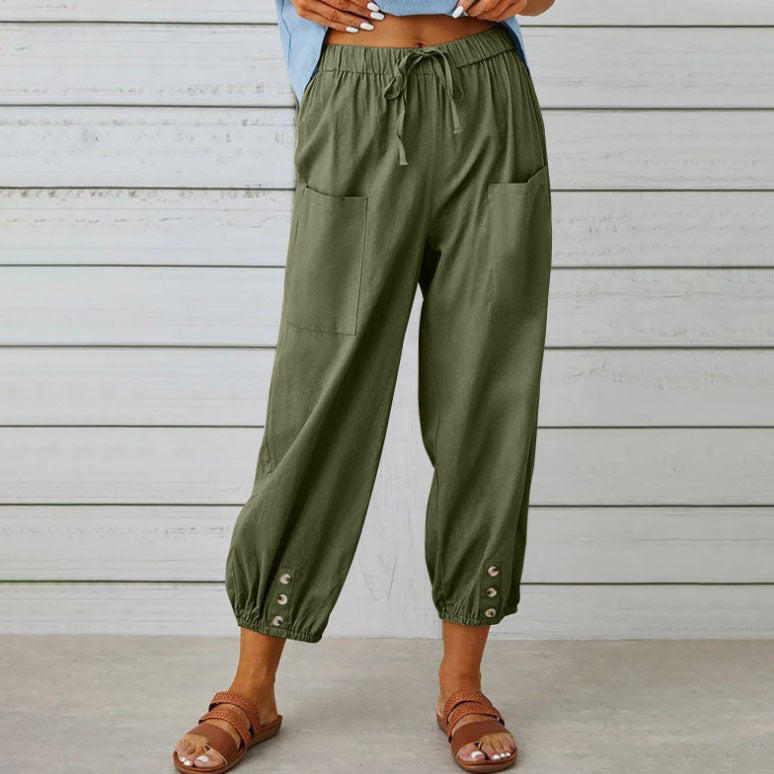 White Victoria lightweight wide-leg trousers, relaxed fit, stylish women's pants with a modern silhouette.