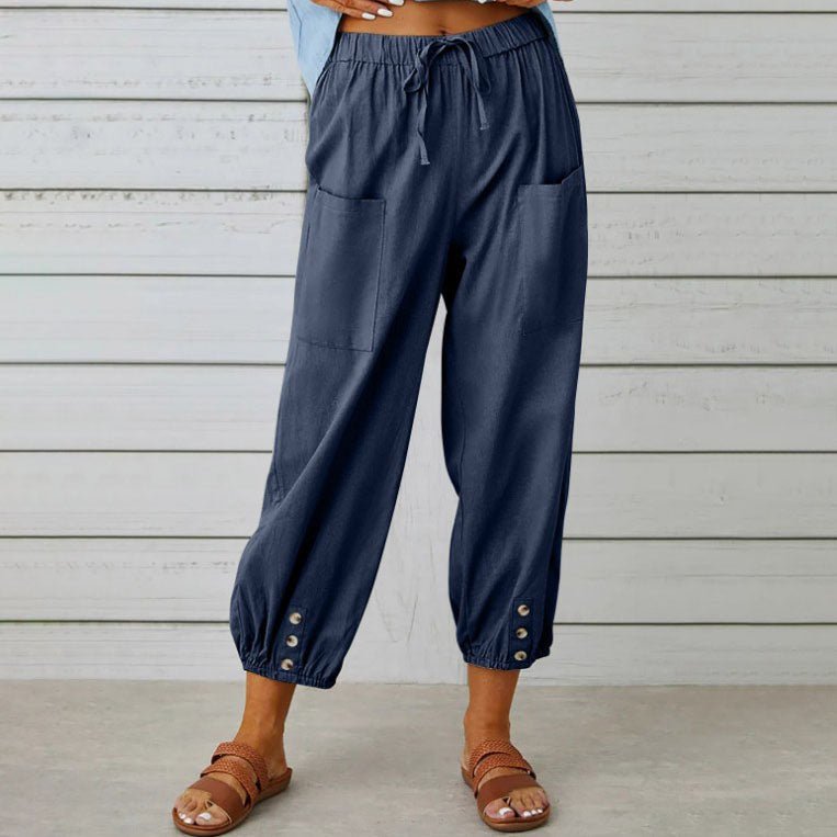 Victoria lightweight wide-leg trousers in white, showcasing their elegant, flowy design and comfortable fit.