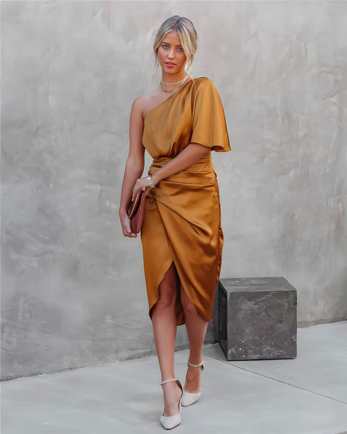 Women's one-shoulder dress with a draped sleeve