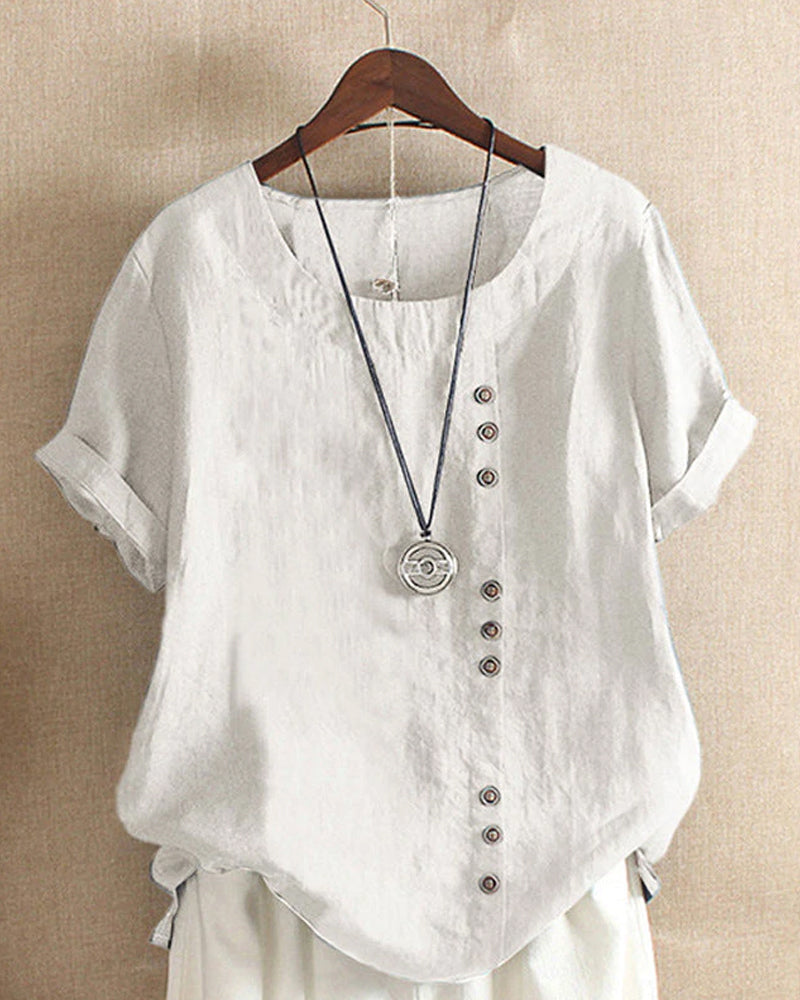 Light beige Beatrice relaxed casual blouse with button details, featuring a comfortable fit and stylish design.