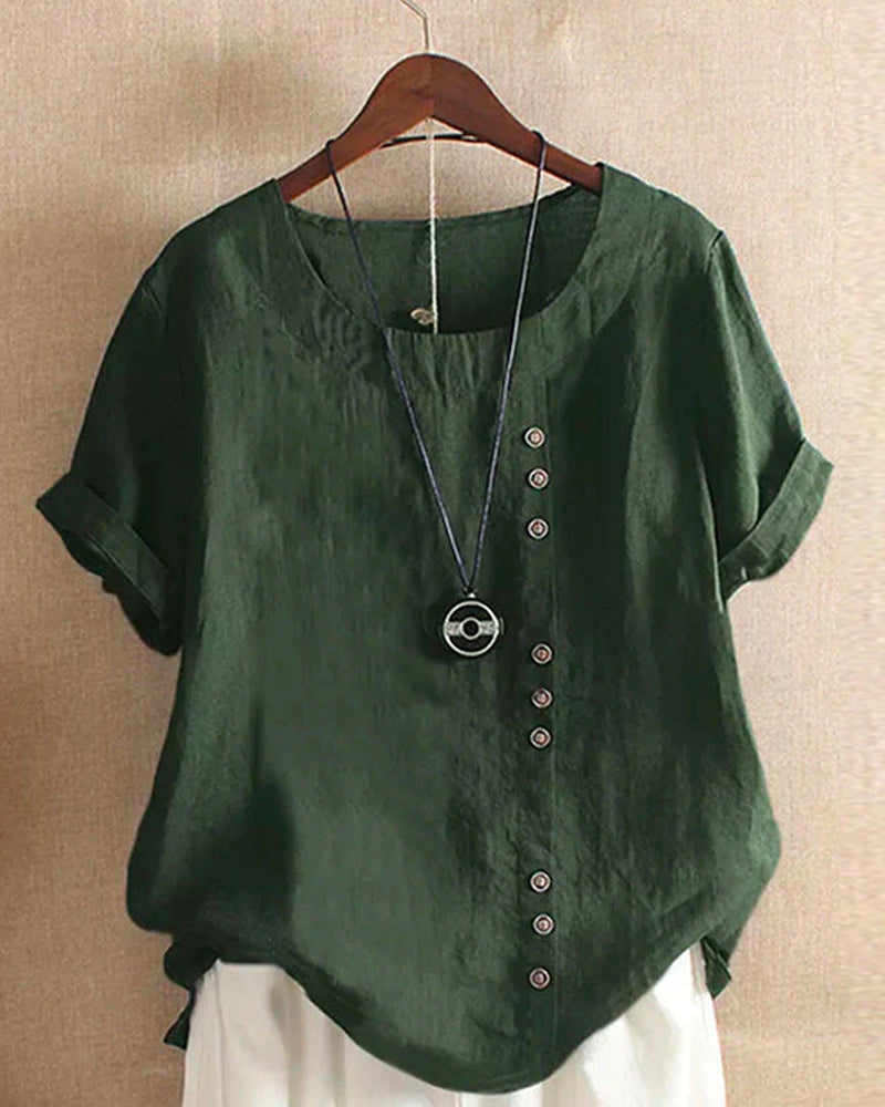Beatrice relaxed summer blouse with button detail, lightweight fabric, and casual fit, shown on a model.