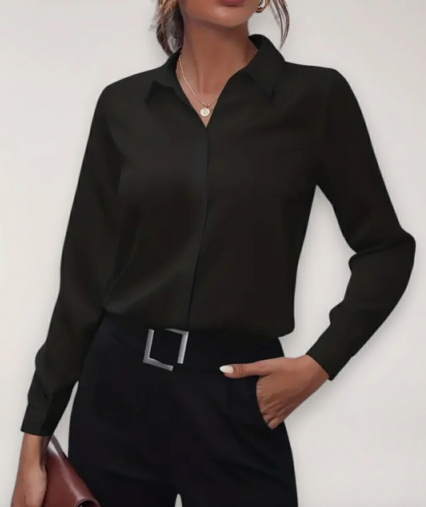 Elegant women's blouse featuring a tailored fit, button-up front, and classic design in soft fabric.