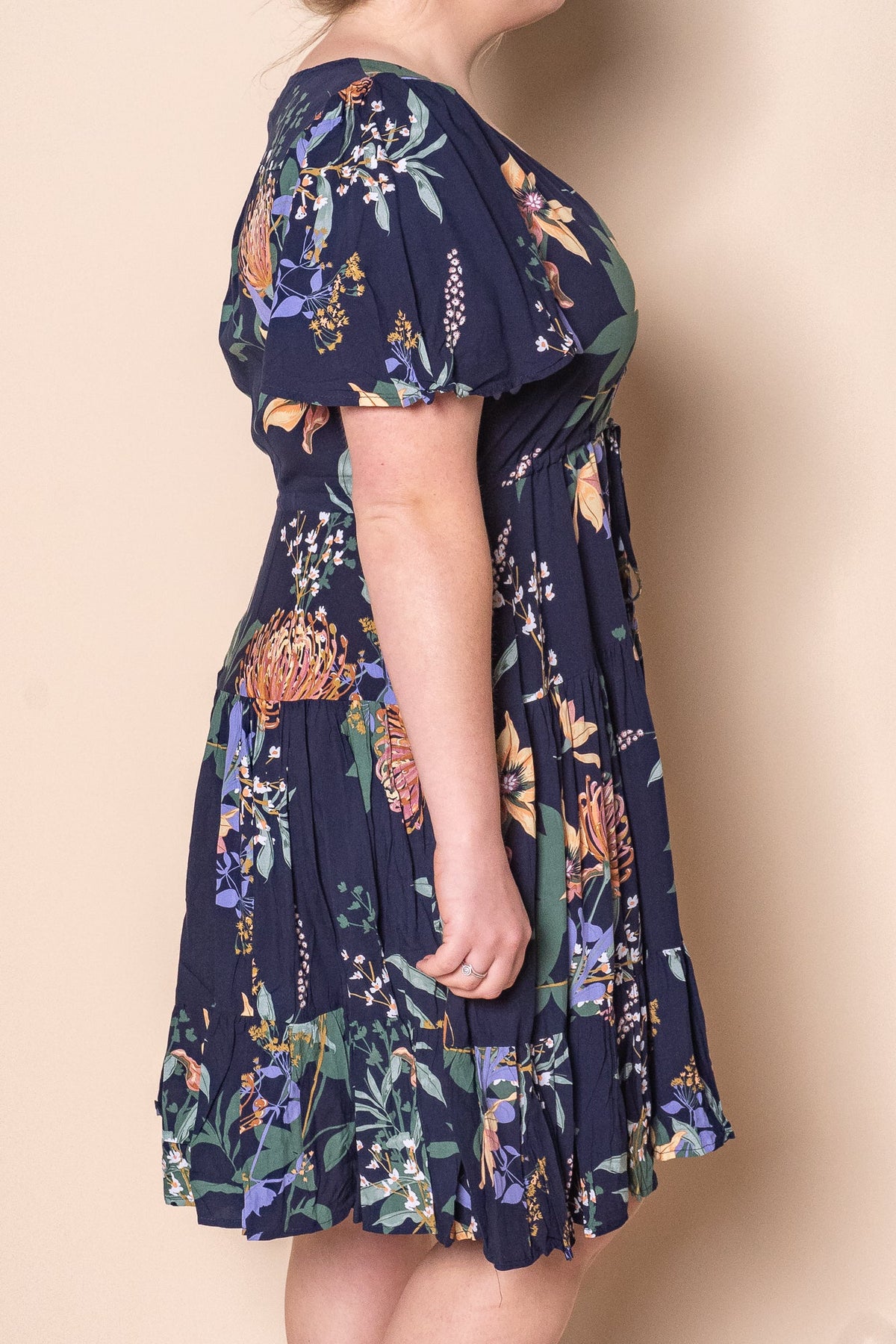 Tiered knee-length dress with a drawstring waist