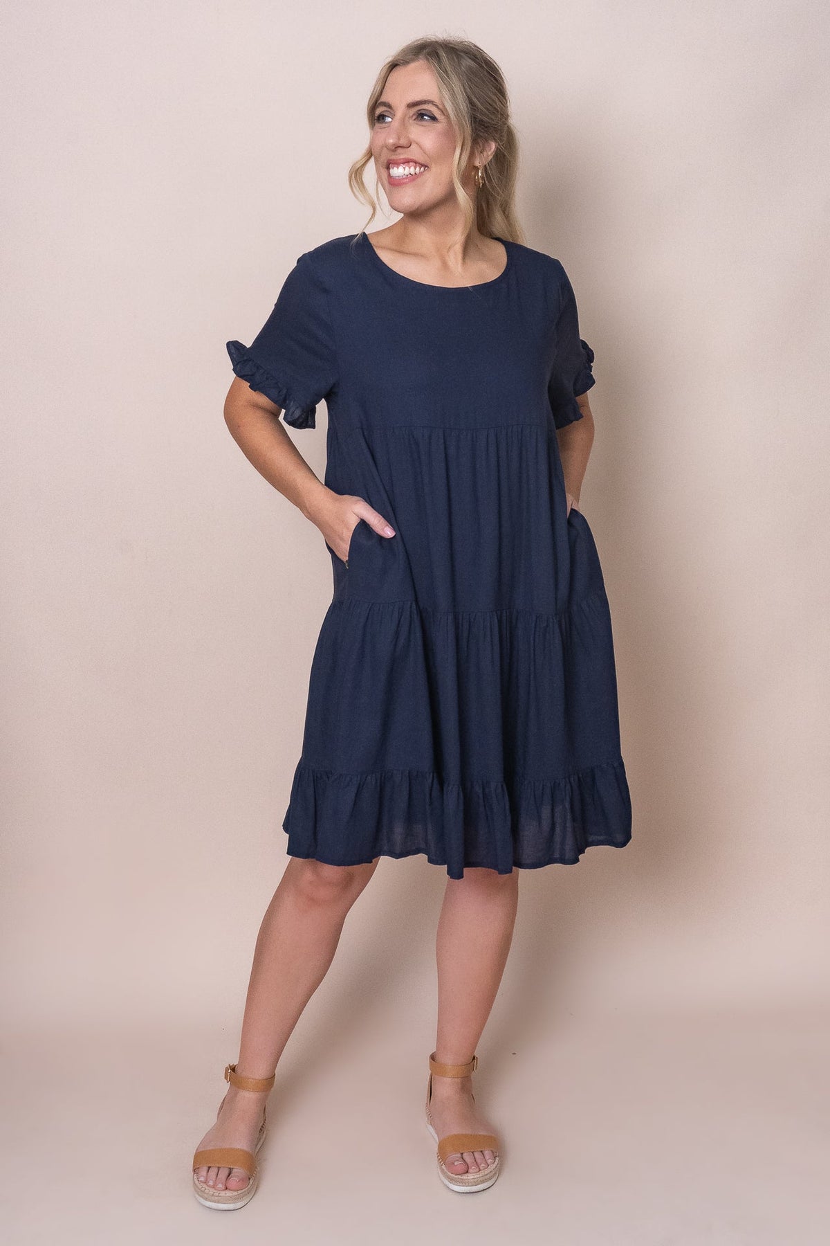 Tiered knee-length dress with a round neckline