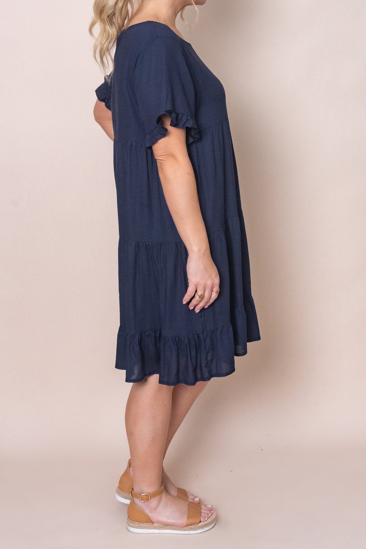 Tiered knee-length dress with a round neckline