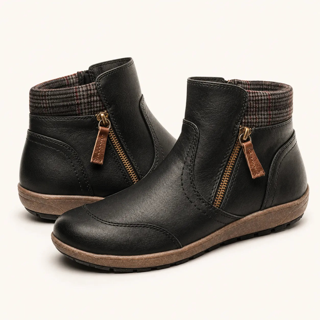 Black ankle boots pair - studio view