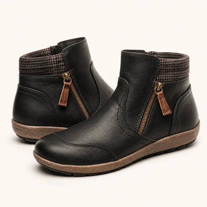 Black ankle boots pair - studio view