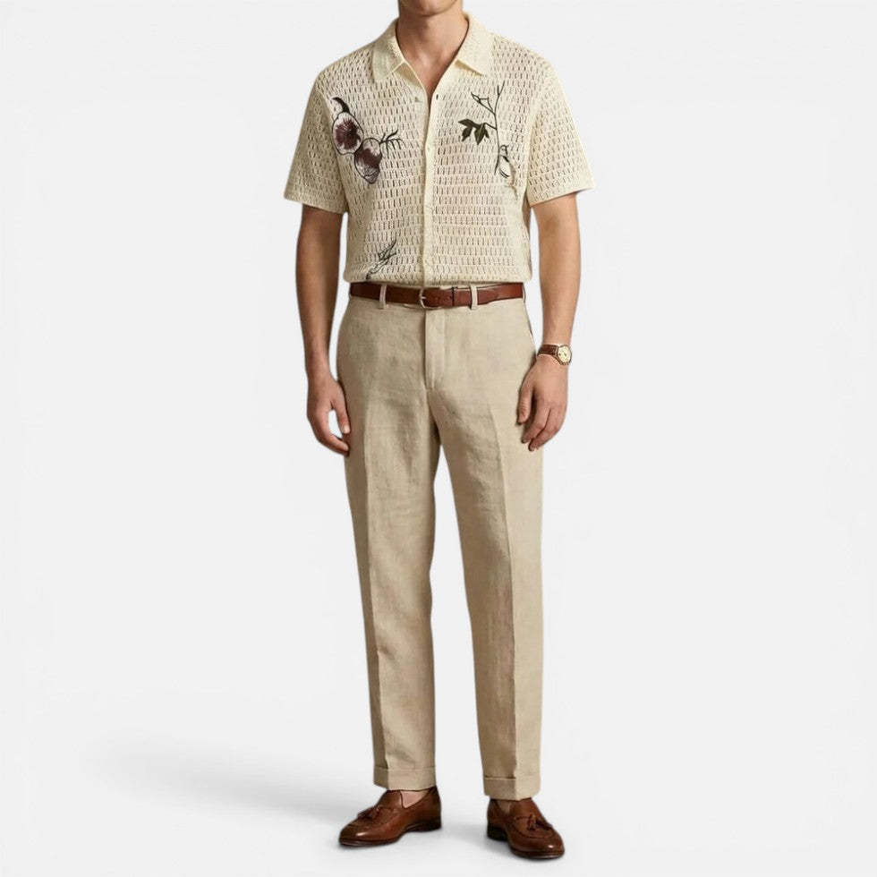 Man wearing a cream button-front crochet shirt, full front view