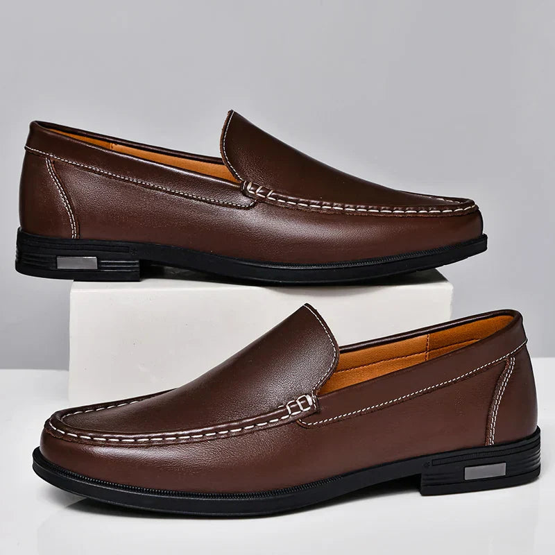 Brown plain-front slip-on dress loafers with moc-toe stitching