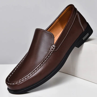Brown plain-front slip-on dress loafers with moc-toe stitching