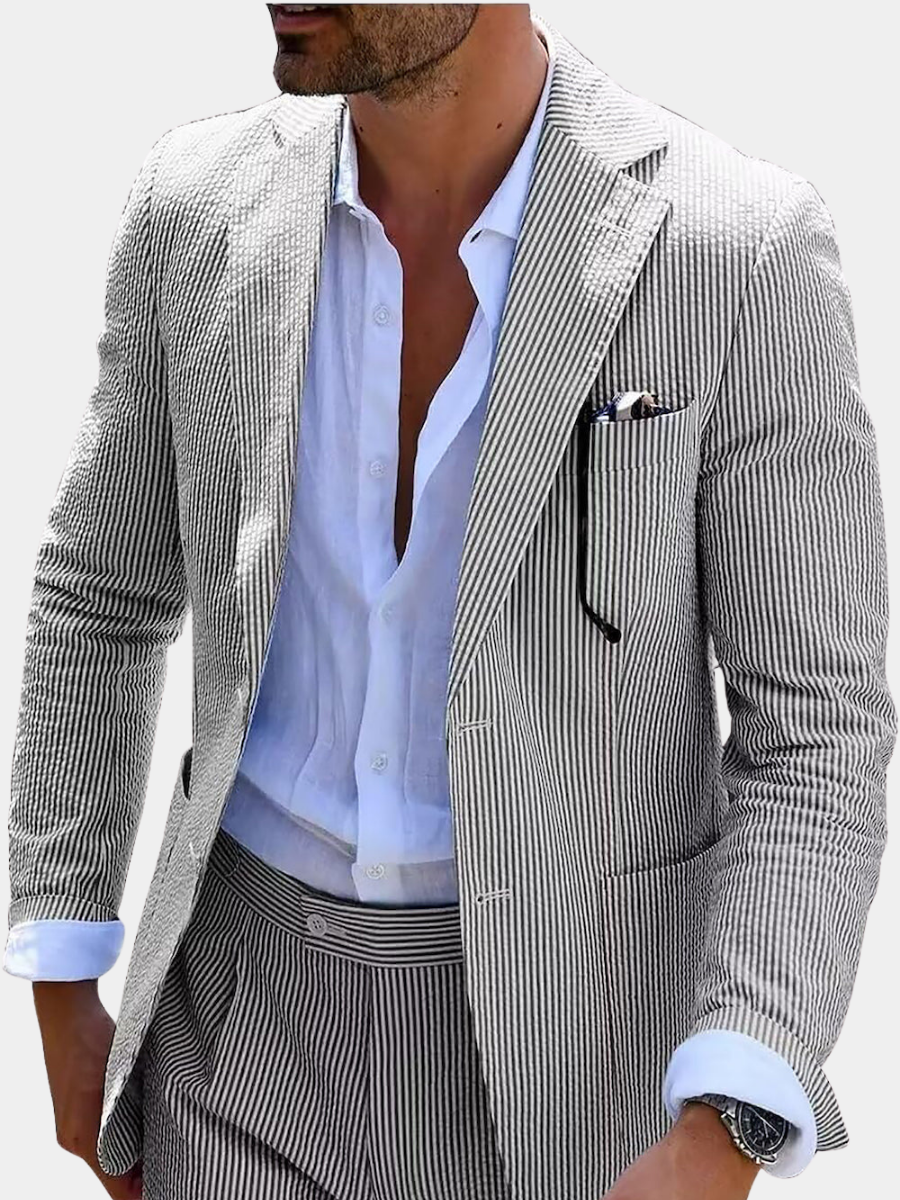 Man wearing a fine-striped suit jacket with matching trousers