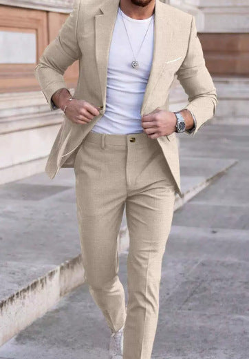 Man wearing a beige suit with a white T-shirt