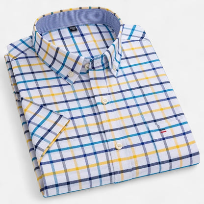 Folded white plaid short-sleeve button-down shirt with navy and yellow lines