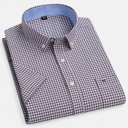 Folded black and white gingham short-sleeve button-down shirt