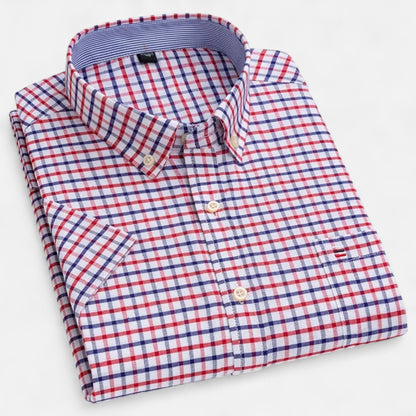 Folded red and navy plaid short-sleeve button-down shirt