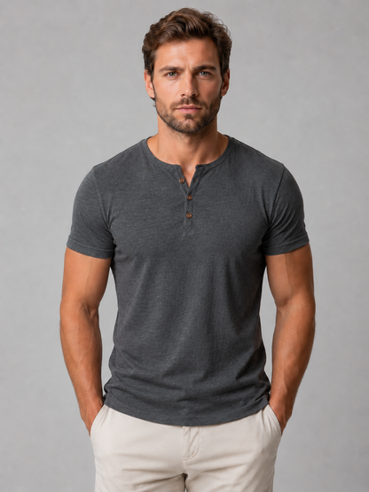 Man wearing a charcoal gray short-sleeve Henley T-shirt, front view