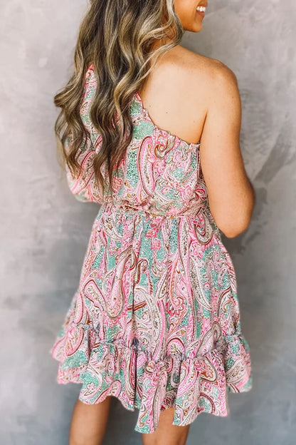 Pink Astra one-shoulder mini dress shown on a model, highlighting its stylish asymmetrical design and fitted silhouette.