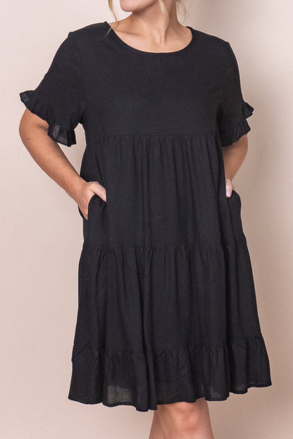 Tiered knee-length dress with a round neckline