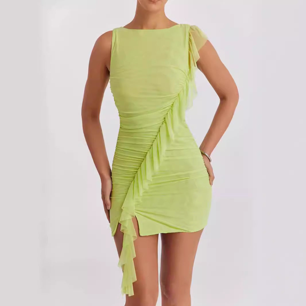 Light green Astra bodycon mini dress, sleeveless and backless design, shown on a model.