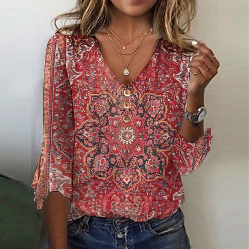 Bohemian print summer blouse with flowing fit, featuring vibrant patterns and lightweight fabric.