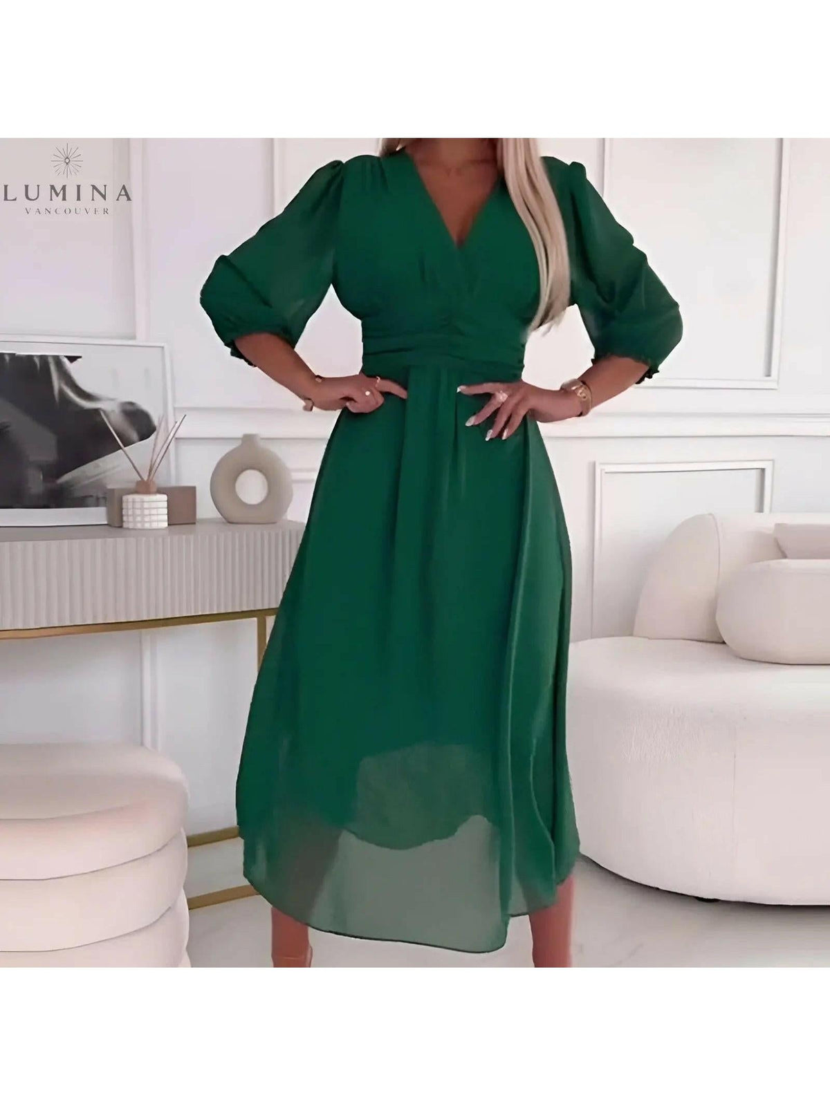 Green Ana stylish wrap dress, evening dress for wedding guests, shown on a model.