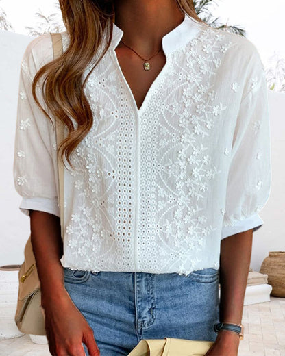 Light pink Victoria puff sleeve blouse with V-neck design, showcasing elegant fabric and stylish details.