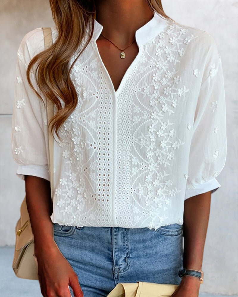 Elegant puff sleeve blouse with V-neck design, featuring a stylish and comfortable fit.