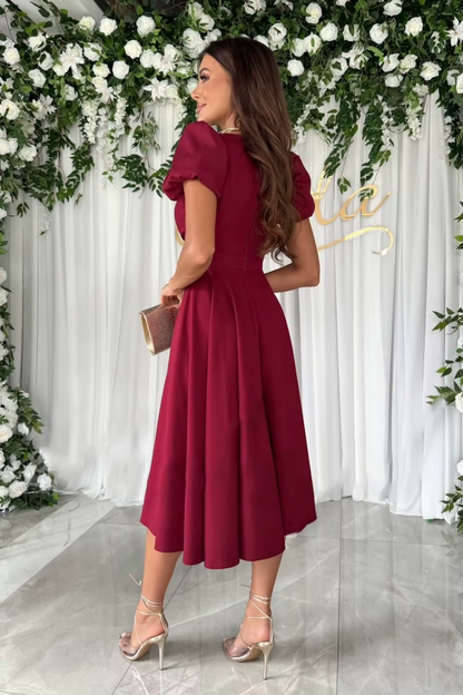 Women's midi dress with a V-neckline