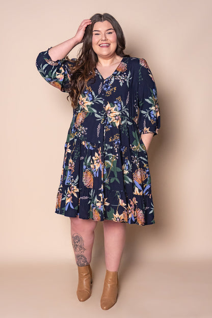 Knee-length floral dress with a drawstring waist