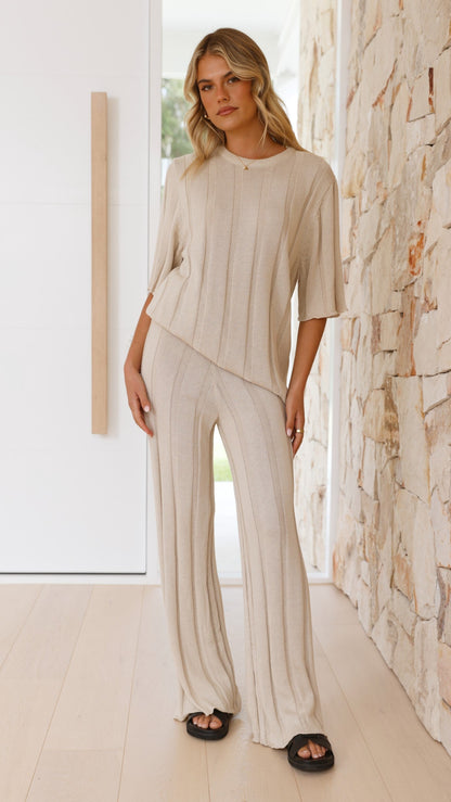 Woman wearing cream Bayu ribbed-knit wide-leg pants, front view
