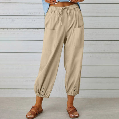 White Victoria lightweight wide-leg trousers with a relaxed fit and elegant style, perfect for casual or chic outfits.