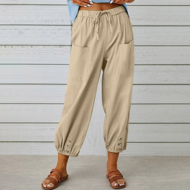 White Victoria lightweight wide-leg trousers with a relaxed fit and elegant style, perfect for casual or chic outfits.