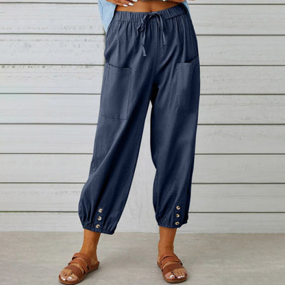 Victoria lightweight wide-leg trousers in white, showcasing their elegant, flowy design and comfortable fit.