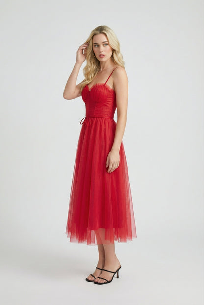 Red Victoria elegant flowy A-line midi dress displayed on a hanger with soft fabric drape.
