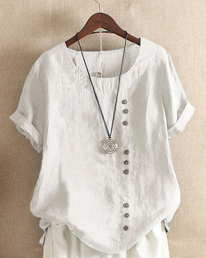 Light beige Beatrice relaxed casual blouse with button details, featuring a comfortable fit and stylish design.