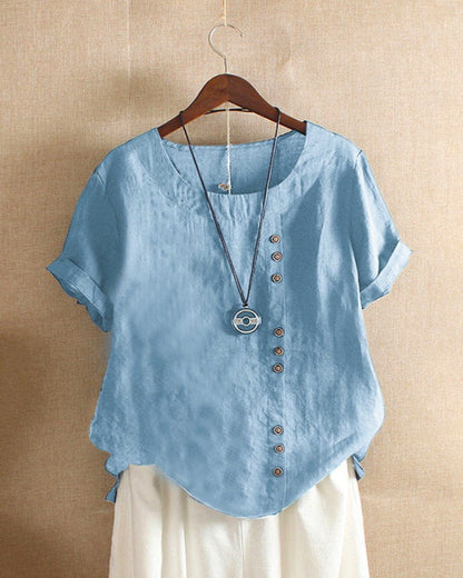 Pink Beatrice relaxed casual blouse with button detail, shown on a model, featuring a comfortable fit and stylish design.