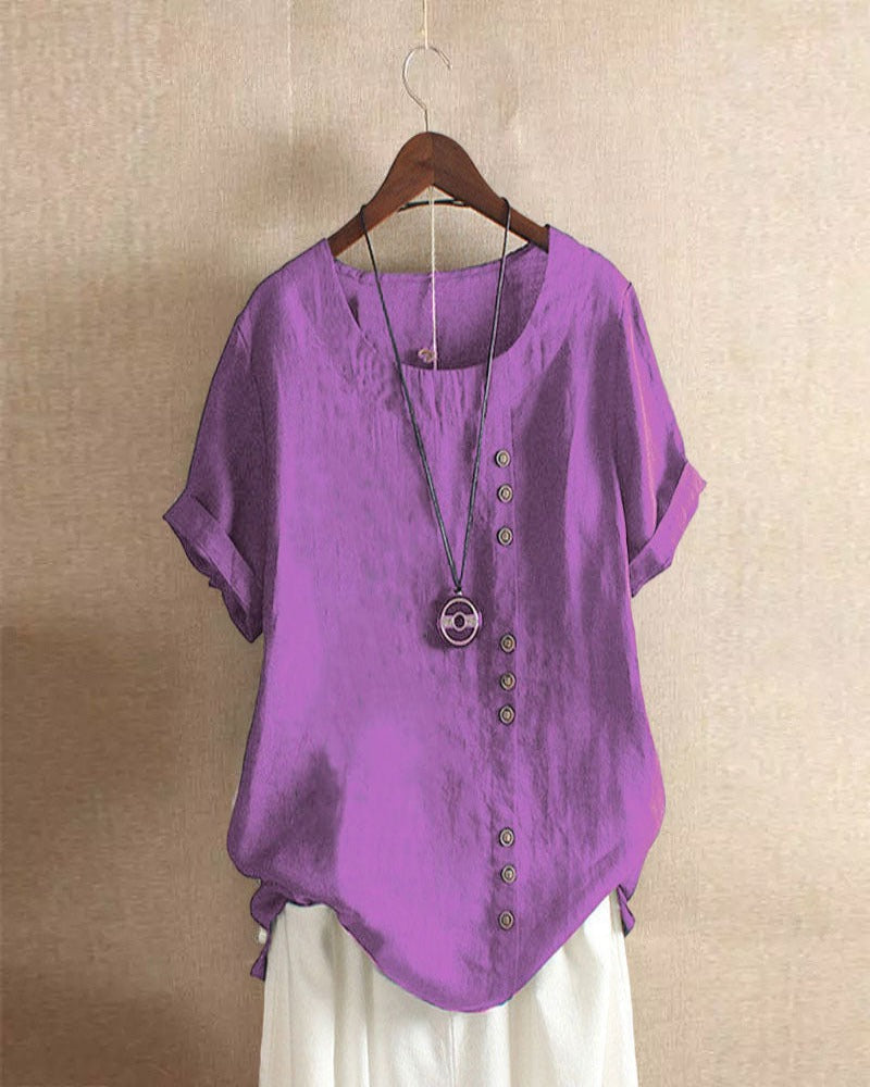 Light beige relaxed summer blouse with button details, featuring a comfortable fit and casual style.