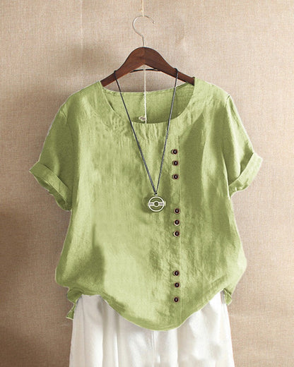 Light beige relaxed summer blouse with button details, featuring a comfortable, flowy fit and casual style.