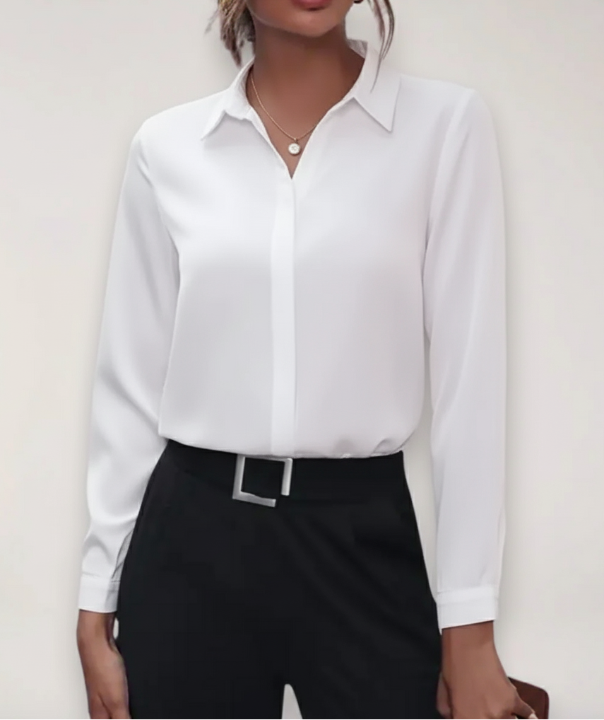 Elegant white tailored button-up women's blouse, featuring a classic collar and long sleeves.
